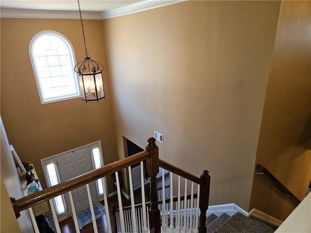 stairs featuring ornamental molding