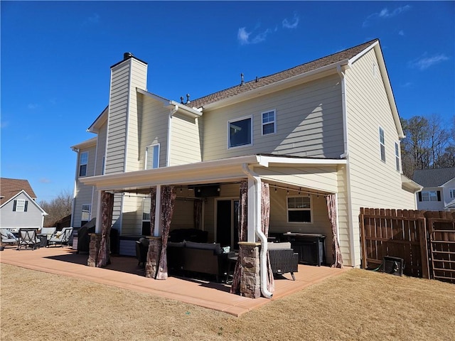 back of property with a patio area