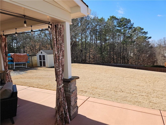 view of patio featuring a shed