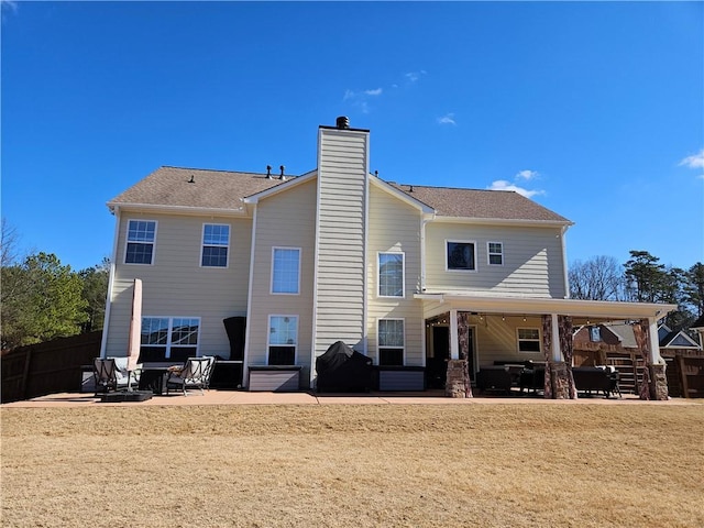 rear view of house with a patio area