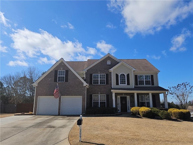 view of front of property with a garage