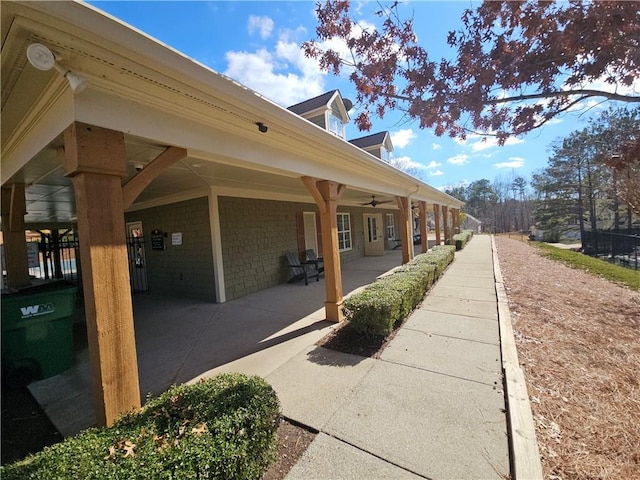 view of home's exterior with ceiling fan