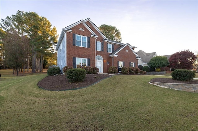 4120 Lakeside Blvd, Monroe, GA 30655 - view of front of house with brick siding and a front lawn