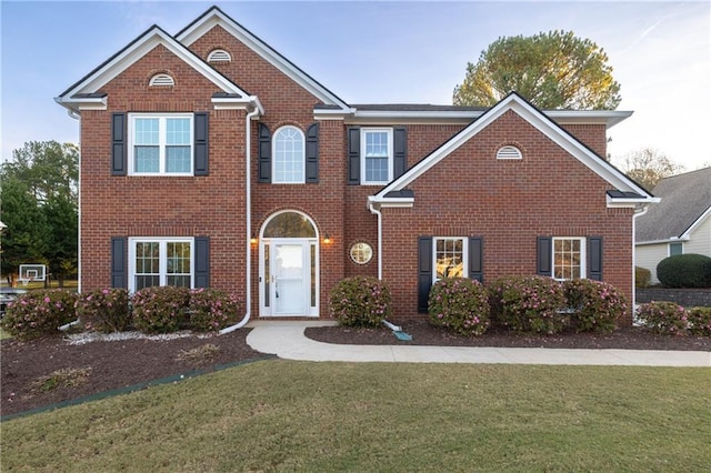 4120 Lakeside Blvd, Monroe, GA 30655 - view of front facade featuring a front lawn and brick siding