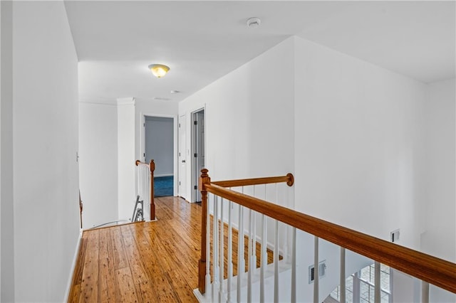 4120 Lakeside Blvd, Monroe, GA 30655 - hall with an upstairs landing and hardwood / wood-style floors