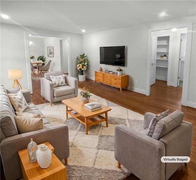 living room with wood-type flooring