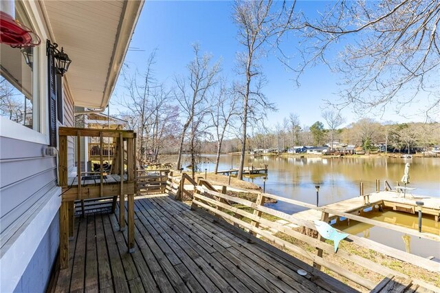 view of front of home featuring stairway and a deck