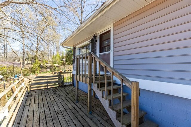 view of front of home with a deck