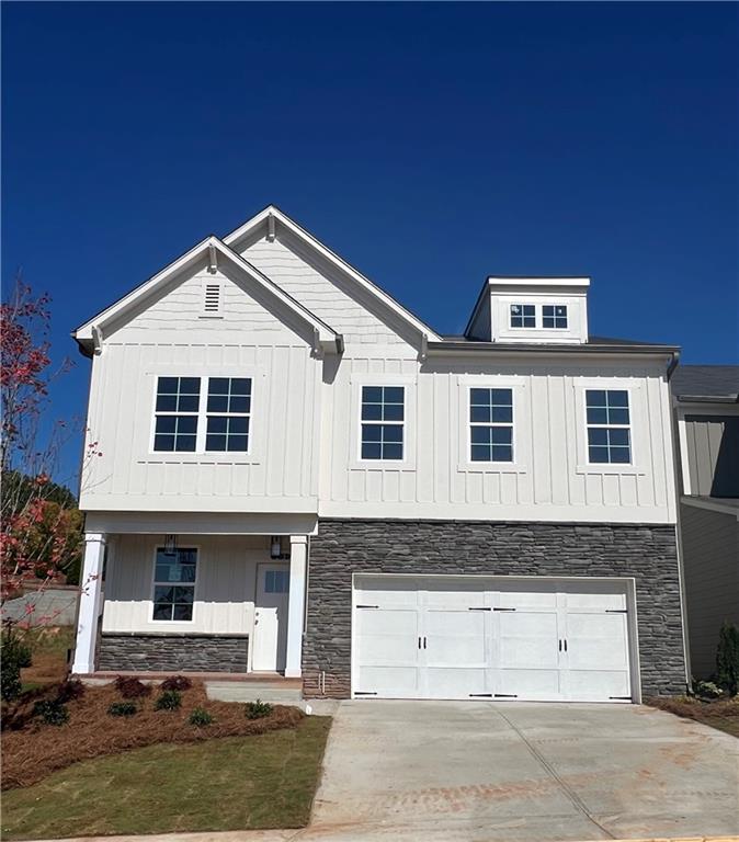 view of front of home featuring a garage