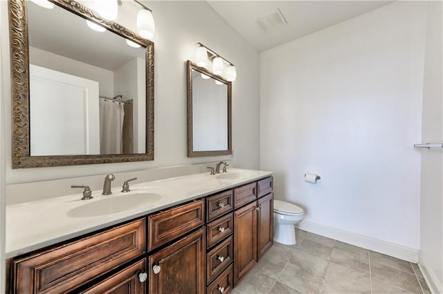 bathroom featuring a shower with curtain, vanity, toilet, and tile patterned flooring