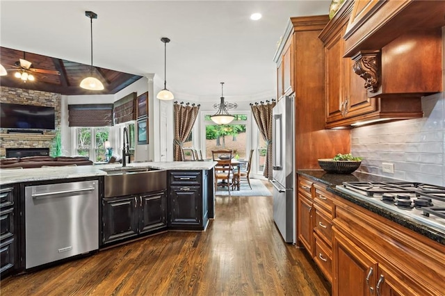 31 Brownson Ct, Acworth, GA 30101 - kitchen featuring light stone countertops, a sink, stainless steel appliances, a ceiling fan, and open floor plan