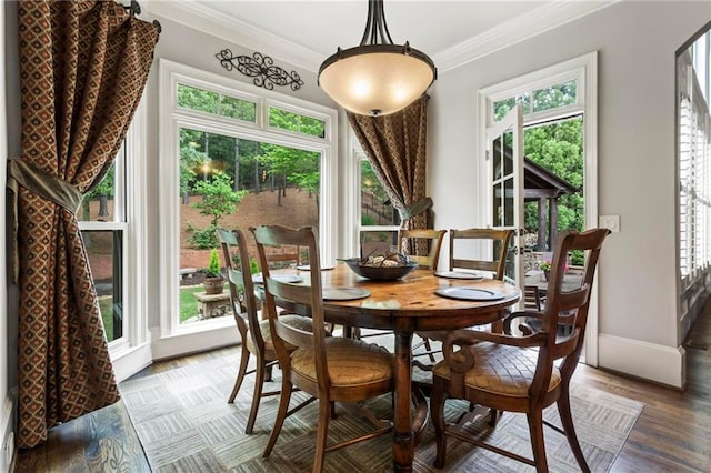 31 Brownson Ct, Acworth, GA 30101 - dining area featuring baseboards, ornamental molding, and wood finished floors