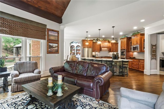 31 Brownson Ct, Acworth, GA 30101 - living room with crown molding, vaulted ceiling, recessed lighting, and dark wood-type flooring