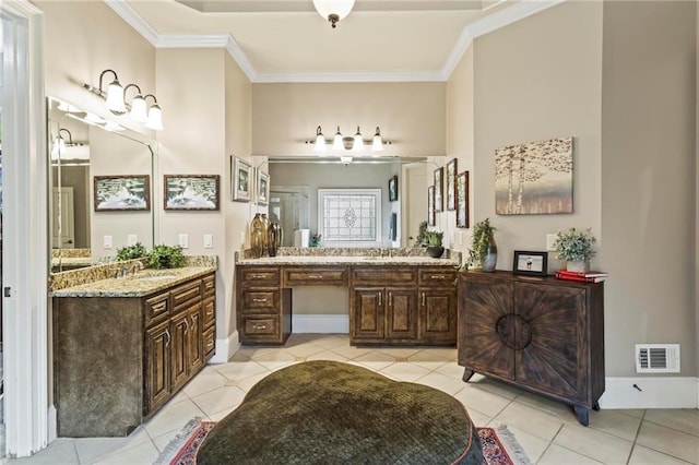 31 Brownson Ct, Acworth, GA 30101 - full bath with crown molding, tile patterned floors, two vanities, and visible vents
