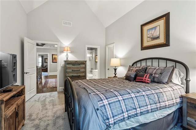 31 Brownson Ct, Acworth, GA 30101 - bedroom featuring visible vents, high vaulted ceiling, baseboards, ensuite bathroom, and carpet
