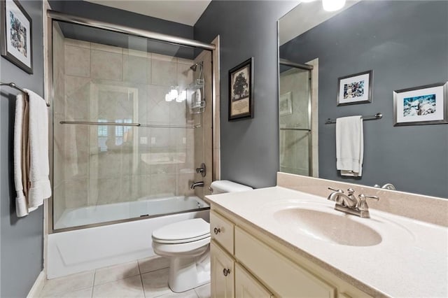 31 Brownson Ct, Acworth, GA 30101 - bathroom featuring toilet, enclosed tub / shower combo, tile patterned flooring, and vanity