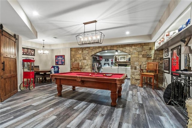 31 Brownson Ct, Acworth, GA 30101 - game room with an inviting chandelier, wood finished floors, a barn door, pool table, and arched walkways