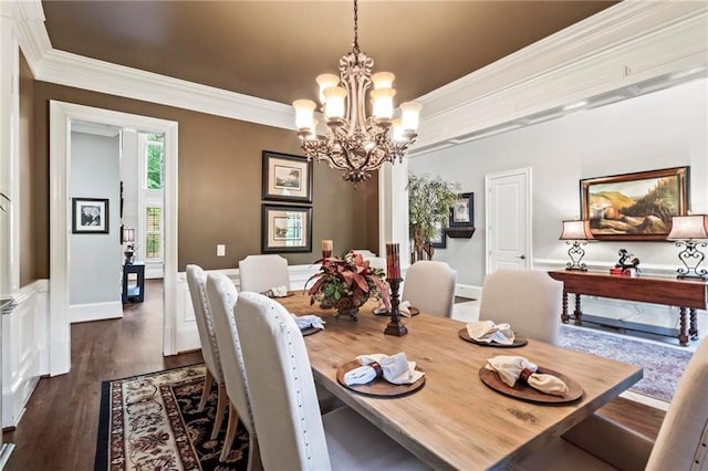 31 Brownson Ct, Acworth, GA 30101 - dining room with an inviting chandelier, ornamental molding, and dark wood-style flooring