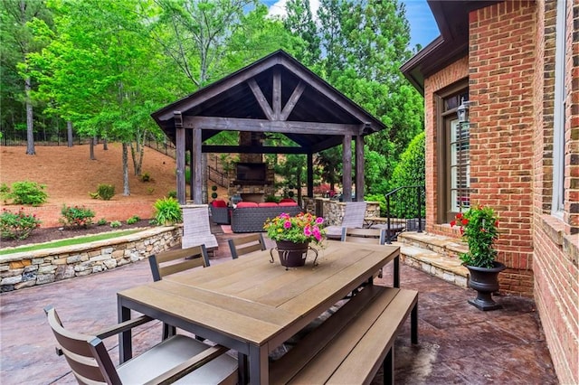 31 Brownson Ct, Acworth, GA 30101 - view of patio / terrace featuring a gazebo, outdoor dining area, and an outdoor living space with a fireplace