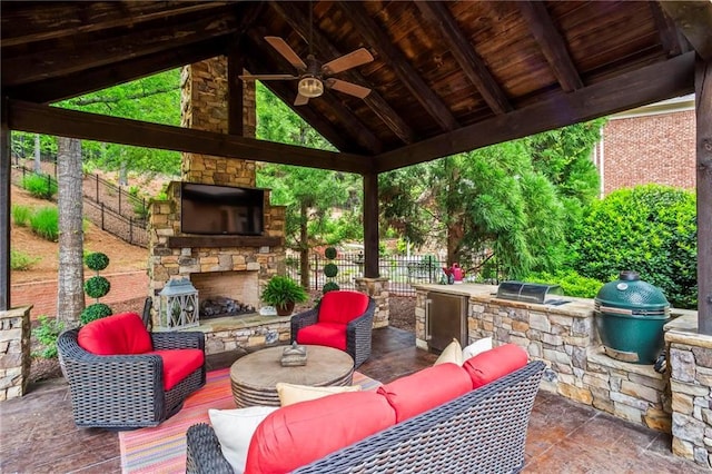 31 Brownson Ct, Acworth, GA 30101 - view of patio featuring fence, an outdoor living space with a fireplace, a gazebo, exterior kitchen, and a ceiling fan