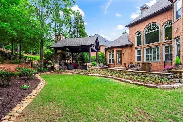 31 Brownson Ct, Acworth, GA 30101 - view of yard featuring a gazebo, fence, an outdoor hangout area, and a patio area