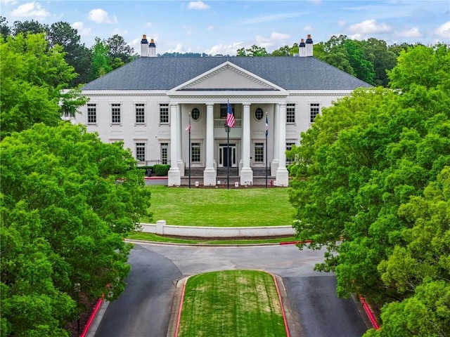 31 Brownson Ct, Acworth, GA 30101 - greek revival house featuring a front yard and a chimney