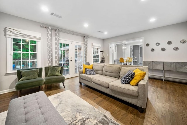 1315 Merry Ln NE, Atlanta, GA 30329 - living room featuring french doors, wood finished floors, and recessed lighting