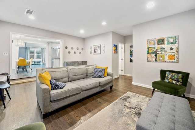 1315 Merry Ln NE, Atlanta, GA 30329 - living area with recessed lighting and wood finished floors