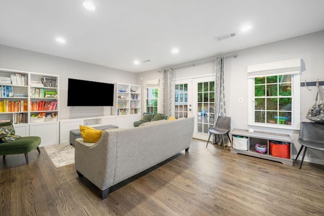 1315 Merry Ln NE, Atlanta, GA 30329 - living room featuring french doors, wood finished floors, and recessed lighting