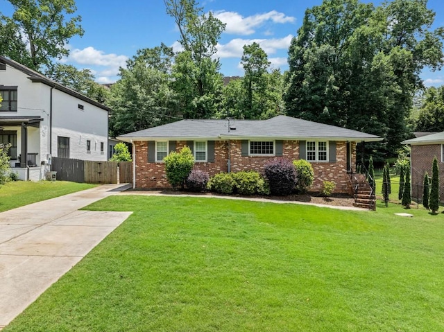 1315 Merry Ln NE, Atlanta, GA 30329 - view of front of property featuring brick siding and concrete driveway