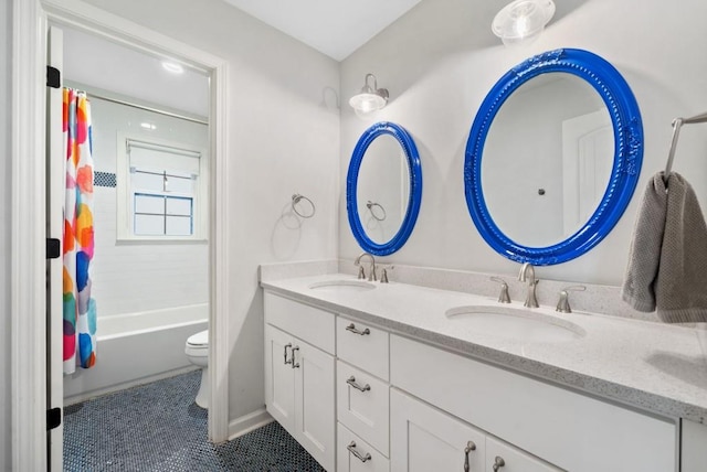 1315 Merry Ln NE, Atlanta, GA 30329 - bathroom featuring double vanity, shower / bath combo, and tile patterned flooring