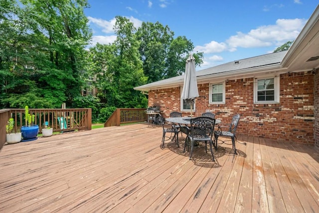 1315 Merry Ln NE, Atlanta, GA 30329 - wooden deck featuring outdoor dining area and grilling area