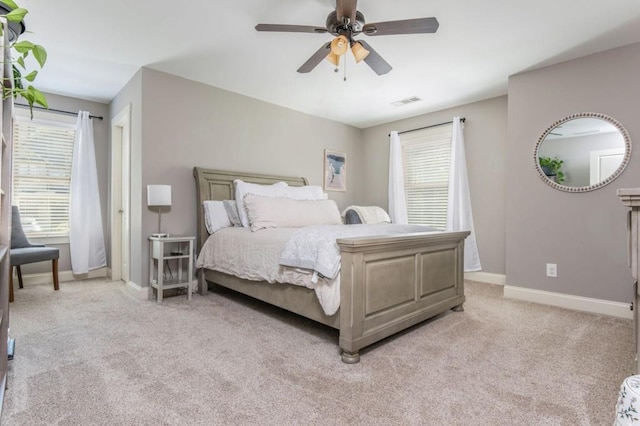 2075 Old Georgian Ter NW, Atlanta, GA 30318 - bedroom with light carpet, baseboards, and a ceiling fan
