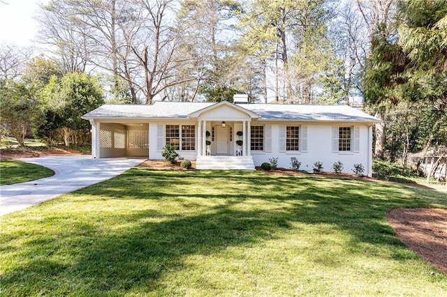 single story home with an attached carport, driveway, a chimney, and a front lawn