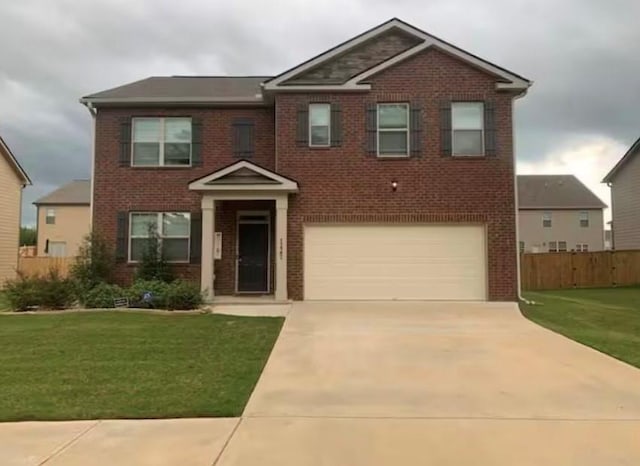 11547 Hathaway Dr, Hampton, GA 30228 - view of front facade featuring brick siding, a garage, and concrete driveway