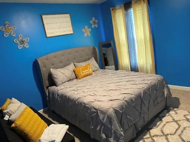 11547 Hathaway Dr, Hampton, GA 30228 - bedroom with carpet flooring and baseboards