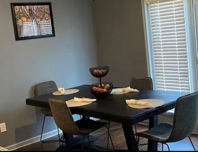 11547 Hathaway Dr, Hampton, GA 30228 - dining area featuring baseboards
