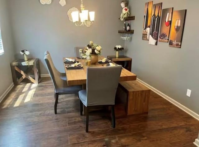 11547 Hathaway Dr, Hampton, GA 30228 - dining space with a chandelier and dark wood-style floors