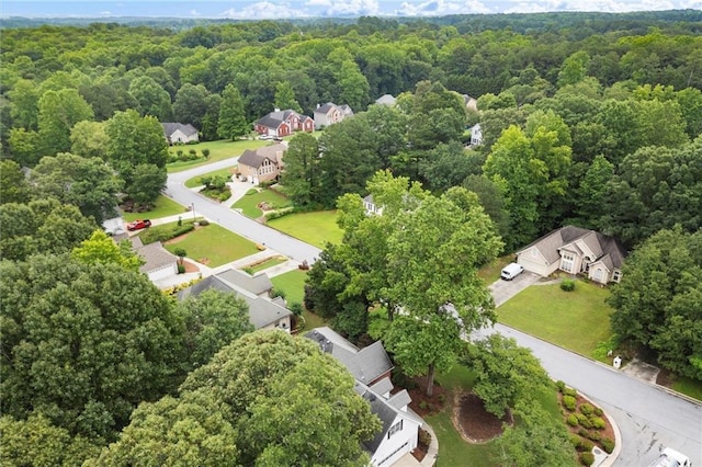 1418 Mill Path Loop, Lawrenceville, GA 30045 - aerial view of residential area featuring a heavily wooded area