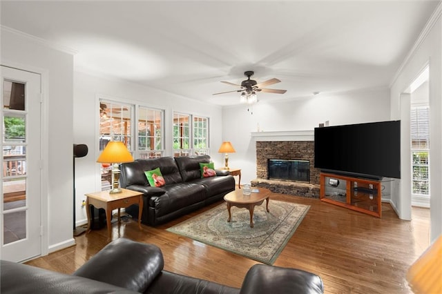 1418 Mill Path Loop, Lawrenceville, GA 30045 - living room with a ceiling fan, plenty of natural light, ornamental molding, and wood finished floors