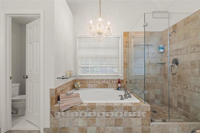 1418 Mill Path Loop, Lawrenceville, GA 30045 - full bathroom featuring a garden tub, a stall shower, a chandelier, and tile patterned floors