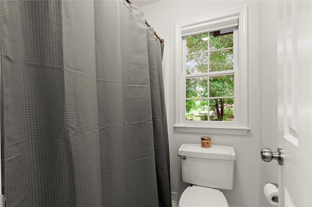 1418 Mill Path Loop, Lawrenceville, GA 30045 - bathroom featuring toilet and curtained shower