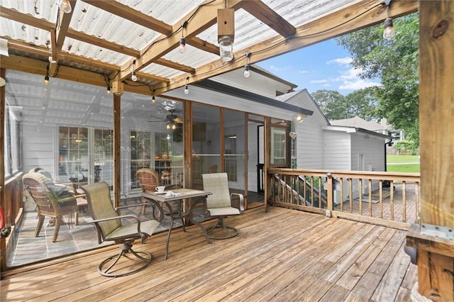 1418 Mill Path Loop, Lawrenceville, GA 30045 - deck featuring a sunroom and ceiling fan