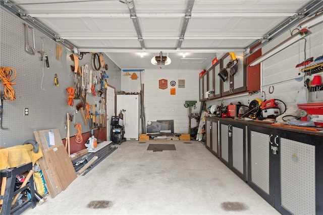 1418 Mill Path Loop, Lawrenceville, GA 30045 - garage featuring a workshop area and a garage door opener