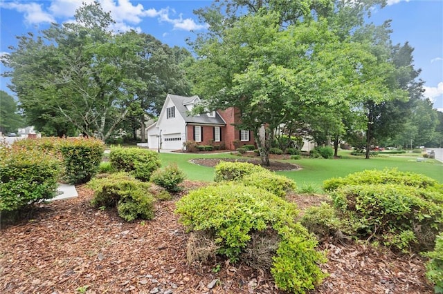 1418 Mill Path Loop, Lawrenceville, GA 30045 - view of grassy yard with an attached garage