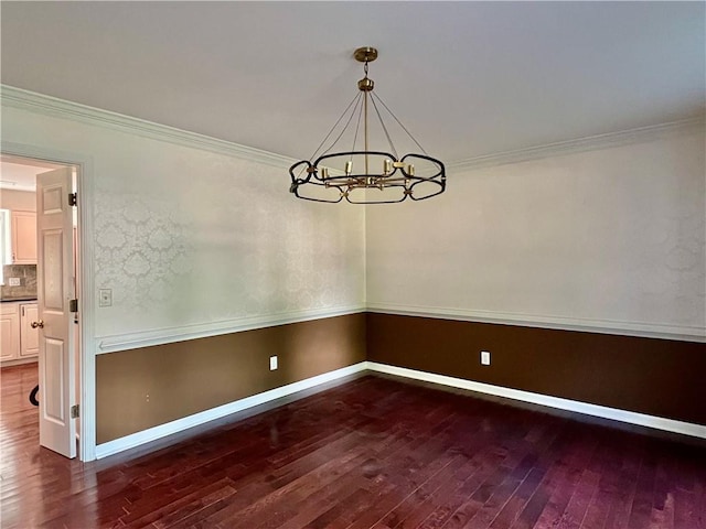 415 Wood Trace Ct, Alpharetta, GA 30022 - unfurnished dining area with a chandelier, dark wood-style floors, and crown molding
