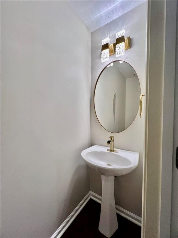 415 Wood Trace Ct, Alpharetta, GA 30022 - bathroom with baseboards and a sink