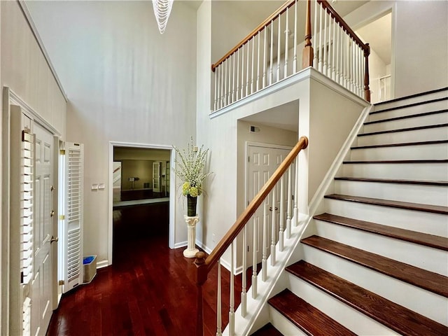 415 Wood Trace Ct, Alpharetta, GA 30022 - stairs with wood finished floors and a towering ceiling