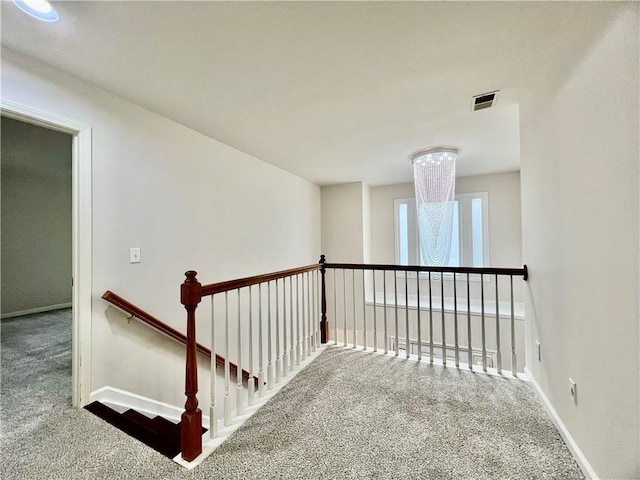 415 Wood Trace Ct, Alpharetta, GA 30022 - hallway featuring carpet floors and an upstairs landing