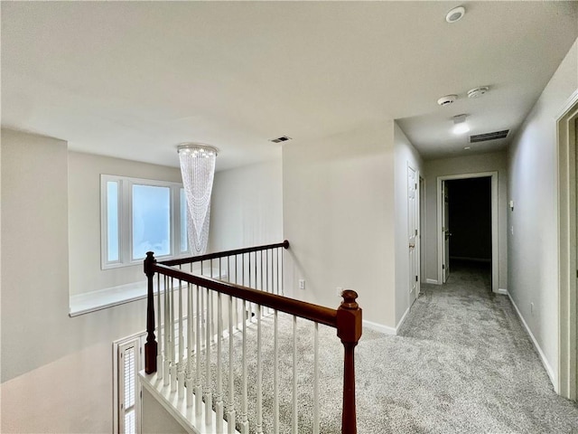 415 Wood Trace Ct, Alpharetta, GA 30022 - corridor featuring an upstairs landing and carpet flooring